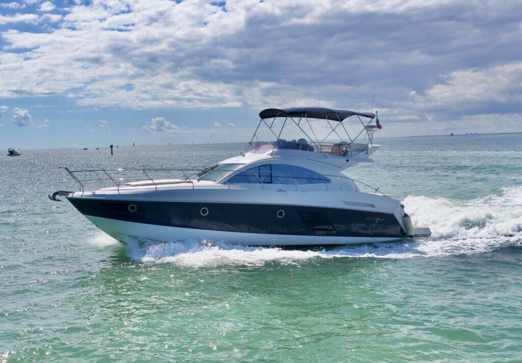 TA, a 52 ft Beneteau 52 Flybridge on the water in Miami